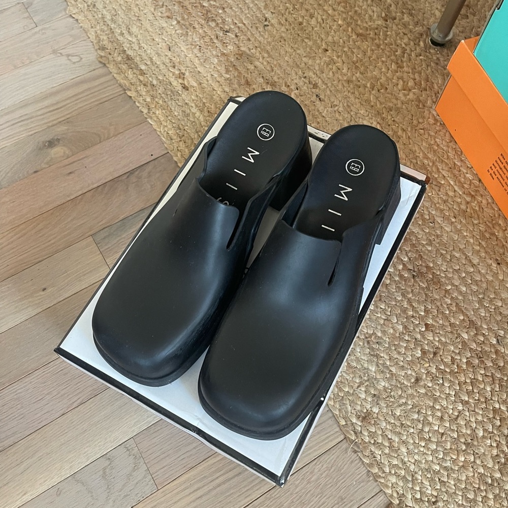 Miista clogs/ mules in black size 40